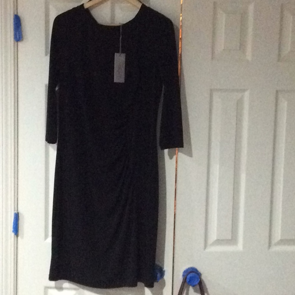 Little black dress, with 3 quarter sleeves.